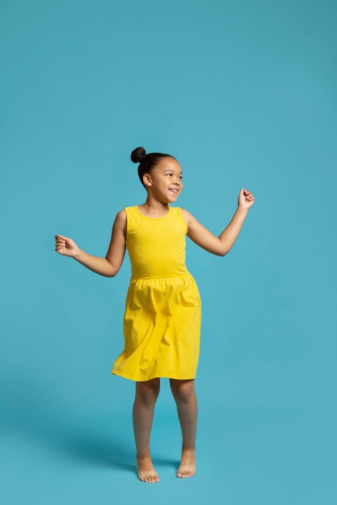kid dancing alone